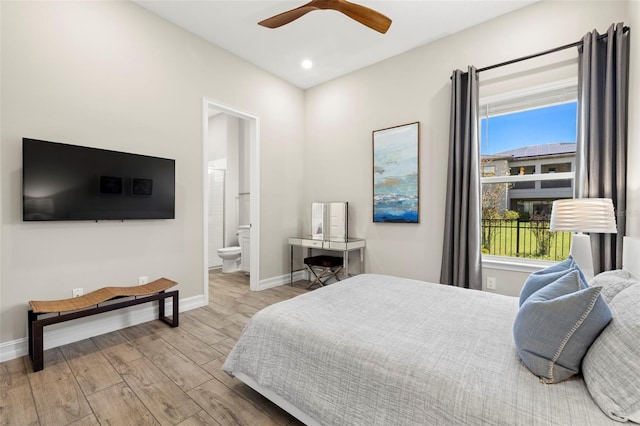 2839 Cordoba Ranch Blvd, Lutz, FL 33559 - bedroom with wood finished floors, recessed lighting, connected bathroom, and a ceiling fan