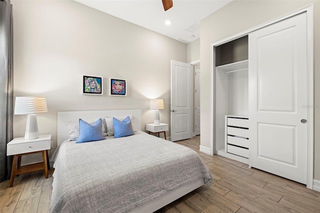 2839 Cordoba Ranch Blvd, Lutz, FL 33559 - bedroom with wood finished floors, a closet, a ceiling fan, and recessed lighting