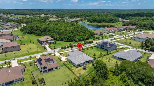 2839 Cordoba Ranch Blvd, Lutz, FL 33559 - aerial view of residential area with a large body of water and a heavily wooded area
