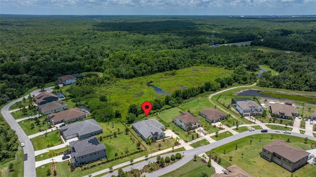 2839 Cordoba Ranch Blvd, Lutz, FL 33559 - aerial view of property and surrounding area featuring a heavily wooded area and nearby suburban area