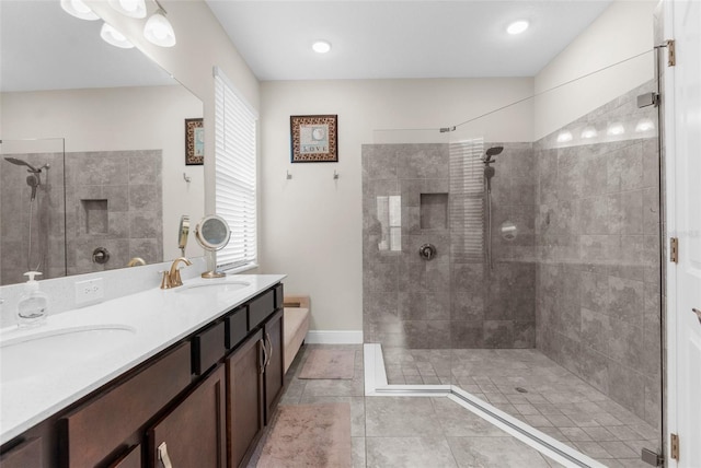 11597 Weaver Hollow Rd, New Port Richey, FL 34654 - bathroom featuring a walk in shower, double vanity, and tile patterned floors