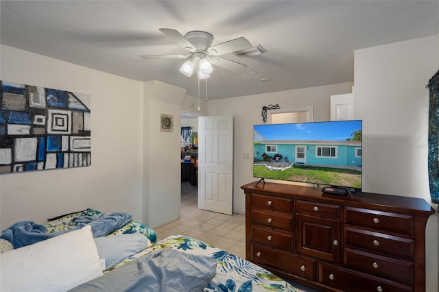 3243 Azalea Dr, Hernando Beach, FL 34607 - bedroom featuring light tile patterned floors and ceiling fan