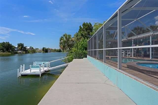 3243 Azalea Dr, Hernando Beach, FL 34607 - dock featuring an outdoor pool, a water view, and glass enclosure