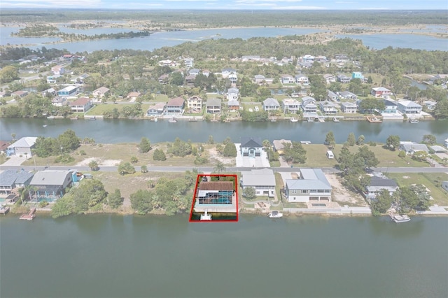 3243 Azalea Dr, Hernando Beach, FL 34607 - aerial view of property and surrounding area featuring nearby suburban area, a large body of water, and property parcel outlined