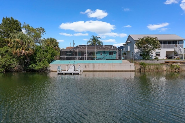 3243 Azalea Dr, Hernando Beach, FL 34607 - dock area with a water view and a lanai