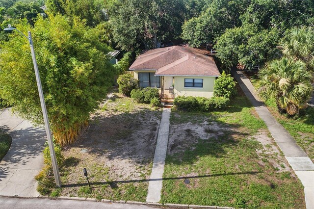 3622 W Mullen Ave, Tampa, FL 33609 - view of front facade featuring stucco siding