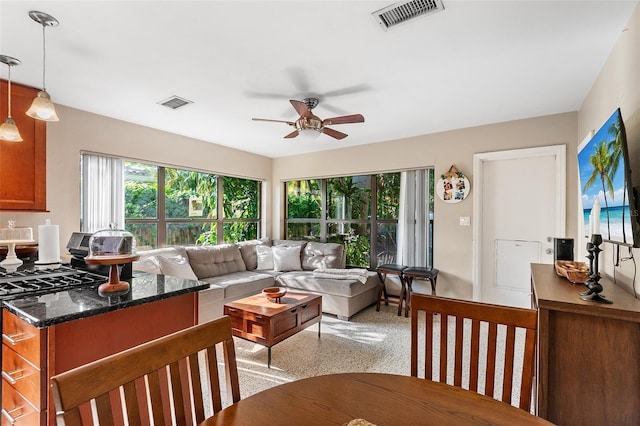 3622 W Mullen Ave, Tampa, FL 33609 - living room with ceiling fan