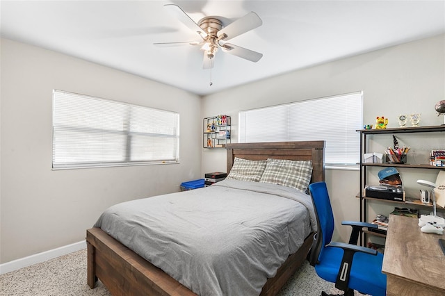 3622 W Mullen Ave, Tampa, FL 33609 - carpeted bedroom with baseboards and a ceiling fan