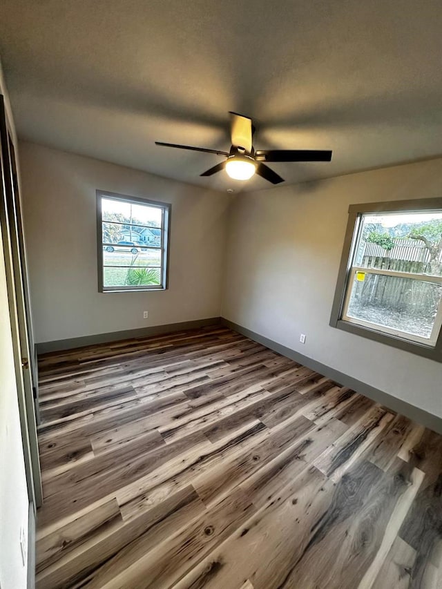 5950 Edison St, Cocoa, FL 32927 - empty room featuring wood finished floors and ceiling fan