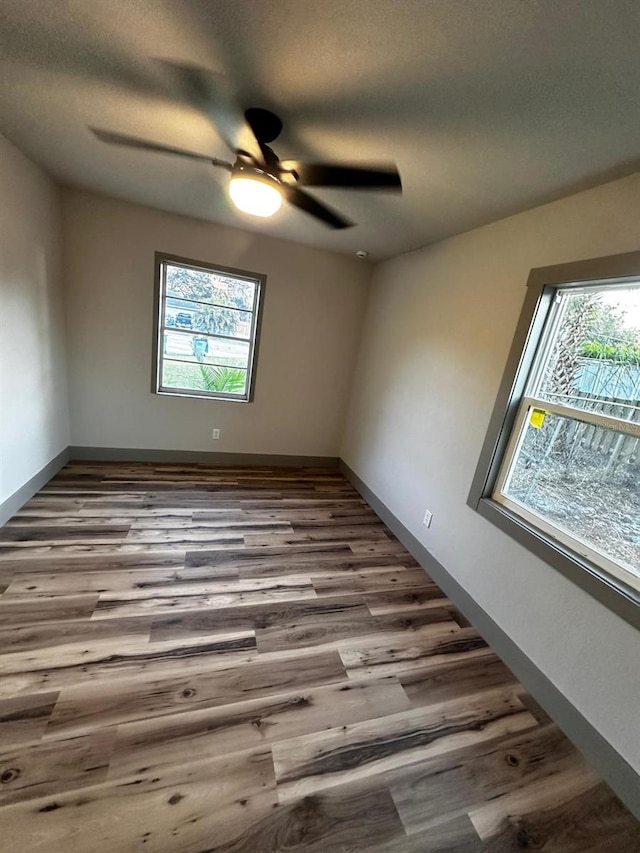 5950 Edison St, Cocoa, FL 32927 - empty room featuring wood finished floors and ceiling fan