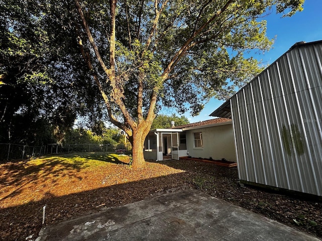5950 Edison St, Cocoa, FL 32927 - view of yard featuring a patio area