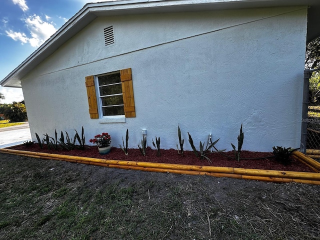5950 Edison St, Cocoa, FL 32927 - view of home's exterior with stucco siding