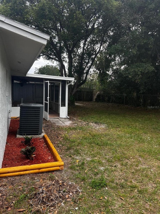 5950 Edison St, Cocoa, FL 32927 - view of yard featuring a sunroom