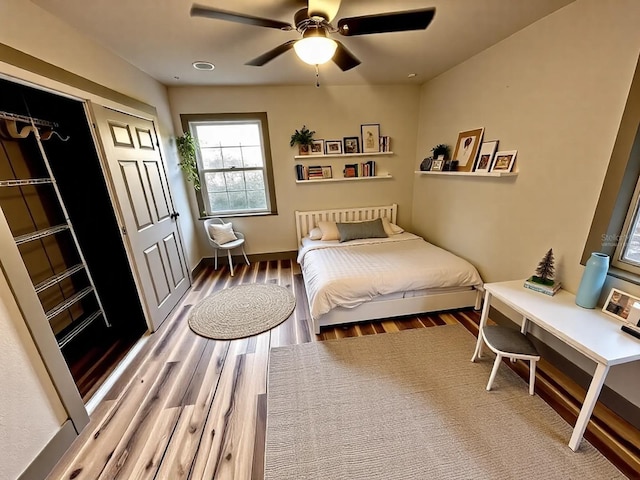 5950 Edison St, Cocoa, FL 32927 - bedroom with wood finished floors and ceiling fan