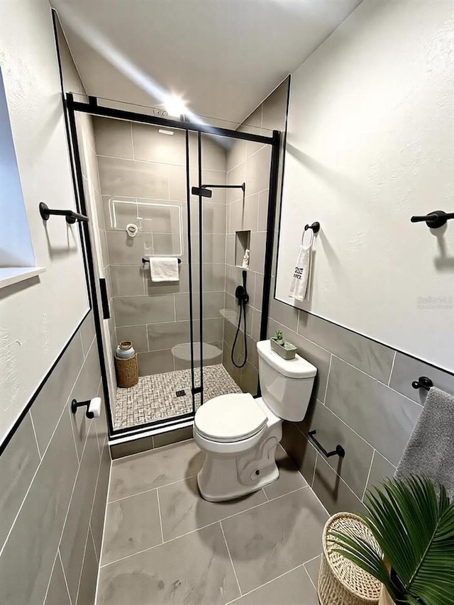 5950 Edison St, Cocoa, FL 32927 - bathroom with tile walls and a stall shower