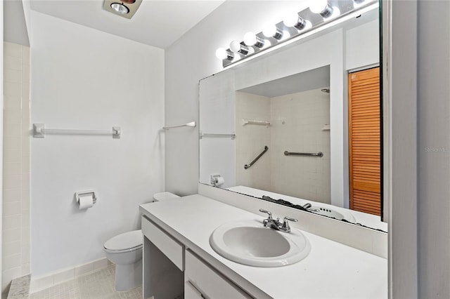 5785 Gardens Dr, Sarasota, FL 34243 - full bath with vanity, a tile shower, and tile patterned flooring