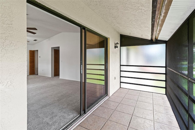 5785 Gardens Dr, Sarasota, FL 34243 - unfurnished sunroom featuring vaulted ceiling