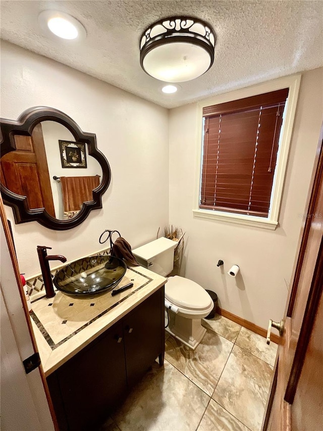 8834 Whispering Oaks Trl, New Port Richey, FL 34654 - half bath with vanity and a textured ceiling