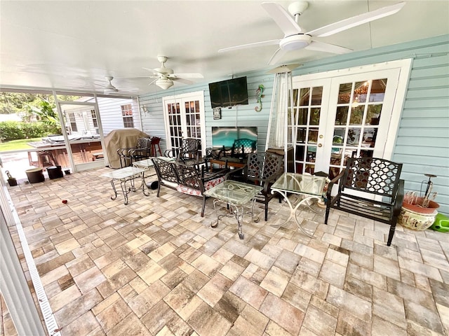 8834 Whispering Oaks Trl, New Port Richey, FL 34654 - view of patio / terrace with french doors, a hot tub, and ceiling fan