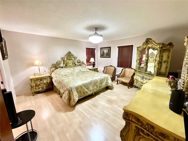 8834 Whispering Oaks Trl, New Port Richey, FL 34654 - bedroom featuring wood finished floors