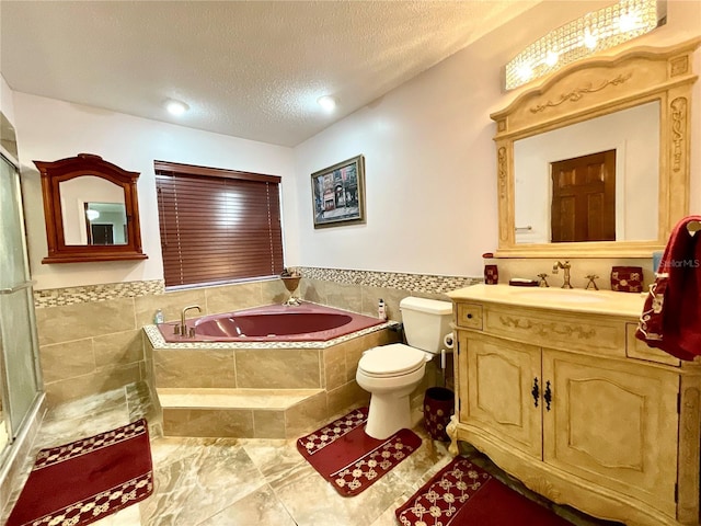 8834 Whispering Oaks Trl, New Port Richey, FL 34654 - full bathroom featuring a garden tub, vanity, a textured ceiling, an enclosed shower, and tile patterned floors