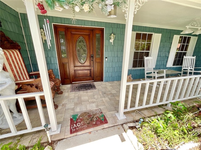 8834 Whispering Oaks Trl, New Port Richey, FL 34654 - view of exterior entry with covered porch