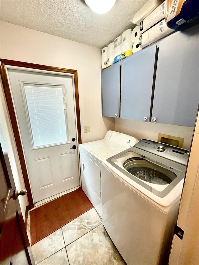 8834 Whispering Oaks Trl, New Port Richey, FL 34654 - laundry room with washing machine and clothes dryer and cabinet space