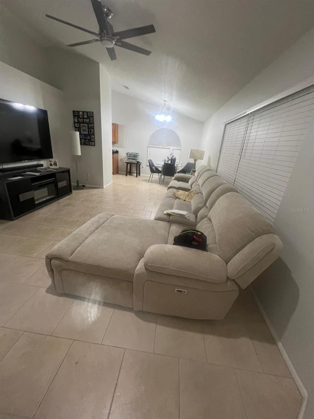 1421 Mohrlake Dr, Brandon, FL 33511 - living room with vaulted ceiling, tile patterned floors, and a ceiling fan