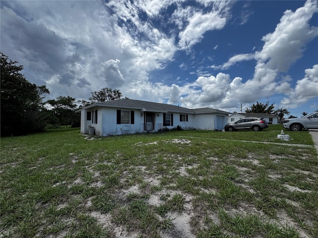 1106 Trellis Ave, Spring Hill, FL 34606 - view of front of house with a front lawn and stucco siding