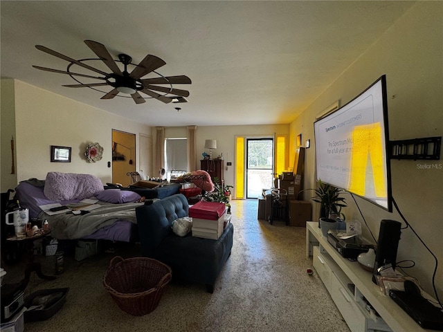 1106 Trellis Ave, Spring Hill, FL 34606 - living area with a ceiling fan and dark speckled floor