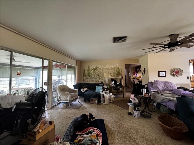 1106 Trellis Ave, Spring Hill, FL 34606 - living room with plenty of natural light, carpet flooring, and a ceiling fan