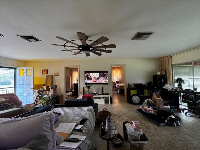 1106 Trellis Ave, Spring Hill, FL 34606 - living room with healthy amount of natural light and ceiling fan