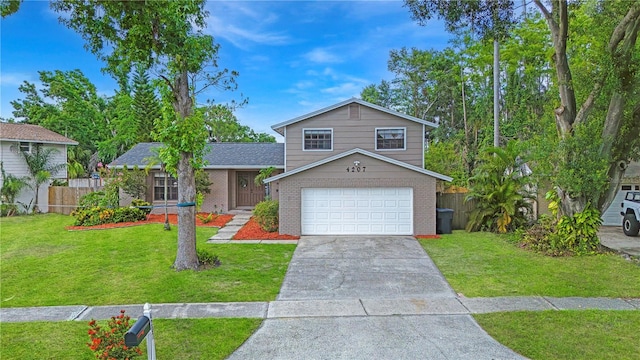 4207 Northwind Ln, Tampa, FL 33624 - view of front of home featuring brick siding, concrete driveway, and an attached garage