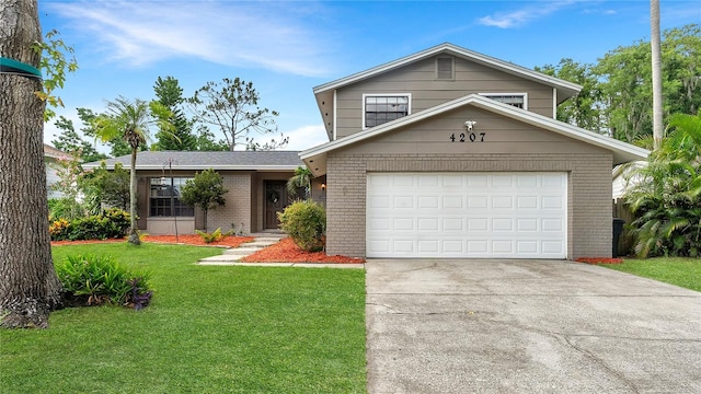4207 Northwind Ln, Tampa, FL 33624 - traditional-style house with brick siding, driveway, a front lawn, and a garage
