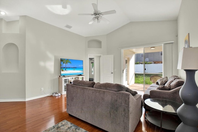 18419 Merseyside Loop, Land O Lakes, FL 34638 - living room with wood finished floors, a ceiling fan, and high vaulted ceiling