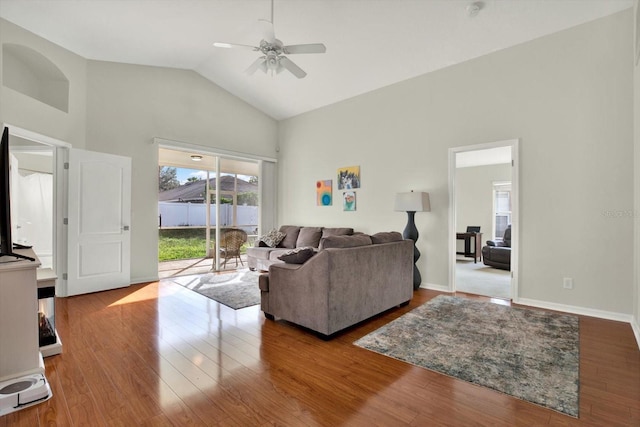 18419 Merseyside Loop, Land O Lakes, FL 34638 - living area with high vaulted ceiling, ceiling fan, and wood finished floors