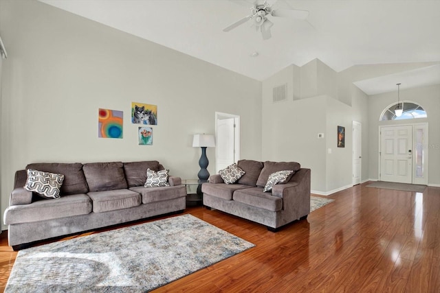 18419 Merseyside Loop, Land O Lakes, FL 34638 - living room featuring high vaulted ceiling, wood finished floors, and ceiling fan