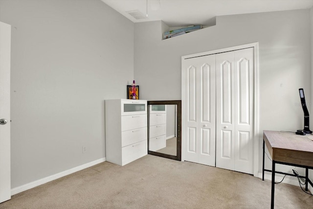 18419 Merseyside Loop, Land O Lakes, FL 34638 - bedroom featuring light carpet and a closet
