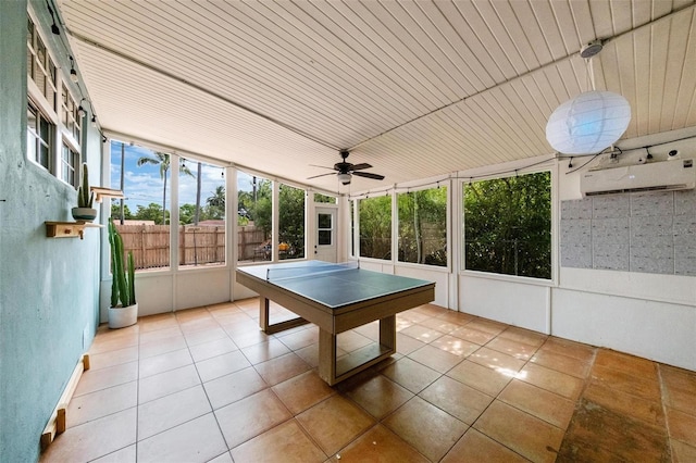 12995 NE 5th Ave, North Miami, FL 33161 - rec room featuring an AC wall unit, a ceiling fan, and tile patterned floors