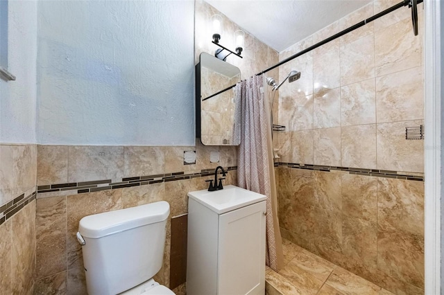 12995 NE 5th Ave, North Miami, FL 33161 - bathroom featuring a tile shower and tile walls