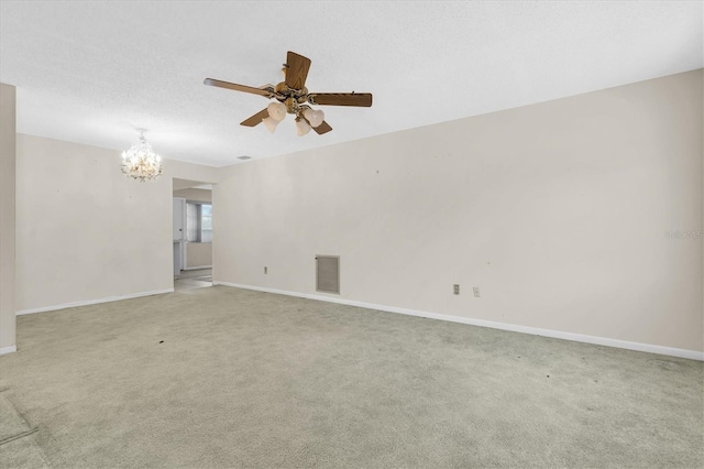 7000 Lafayette N, Pinellas Park, FL 33781 - empty room with a chandelier, ceiling fan, and light colored carpet