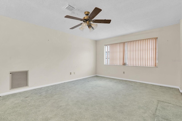 7000 Lafayette N, Pinellas Park, FL 33781 - carpeted spare room with a ceiling fan and a textured ceiling