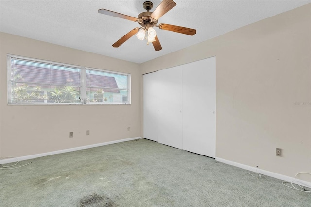 7000 Lafayette N, Pinellas Park, FL 33781 - unfurnished bedroom featuring light colored carpet, a closet, and ceiling fan
