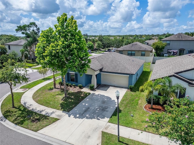 10119 Rose Petal Pl, Riverview, FL 33578 - ranch-style home featuring a garage, driveway, stucco siding, a residential view, and roof with shingles