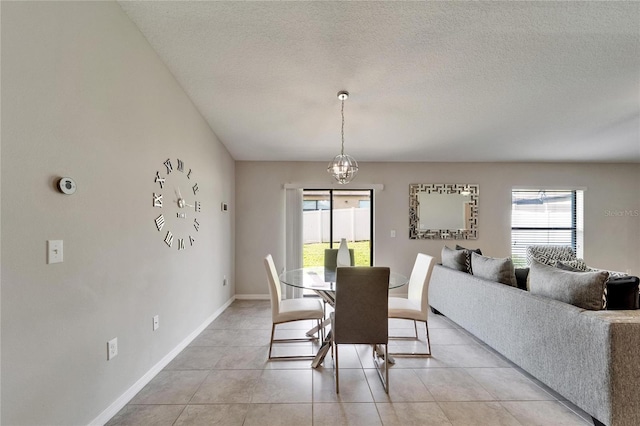 10119 Rose Petal Pl, Riverview, FL 33578 - dining room featuring plenty of natural light, light tile patterned flooring, and a textured ceiling