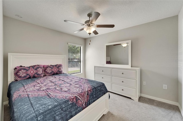 10119 Rose Petal Pl, Riverview, FL 33578 - bedroom with light colored carpet, a ceiling fan, and a textured ceiling