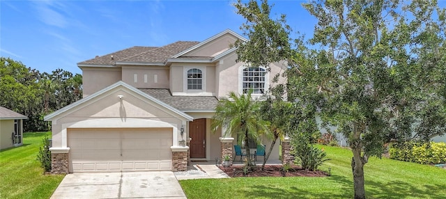 5830 100th Ave E, Parrish, FL 34219 - view of front of house with stucco siding, driveway, a front lawn, a shingled roof, and stone siding