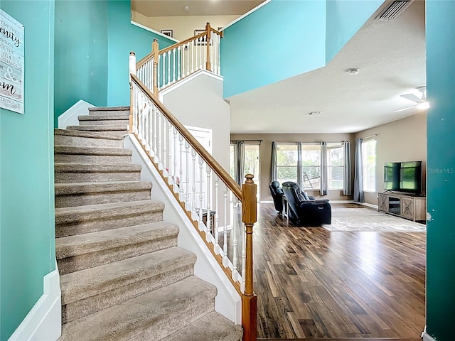 5830 100th Ave E, Parrish, FL 34219 - stairway with wood finished floors and baseboards