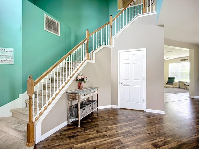 5830 100th Ave E, Parrish, FL 34219 - stairs with wood finished floors and a towering ceiling