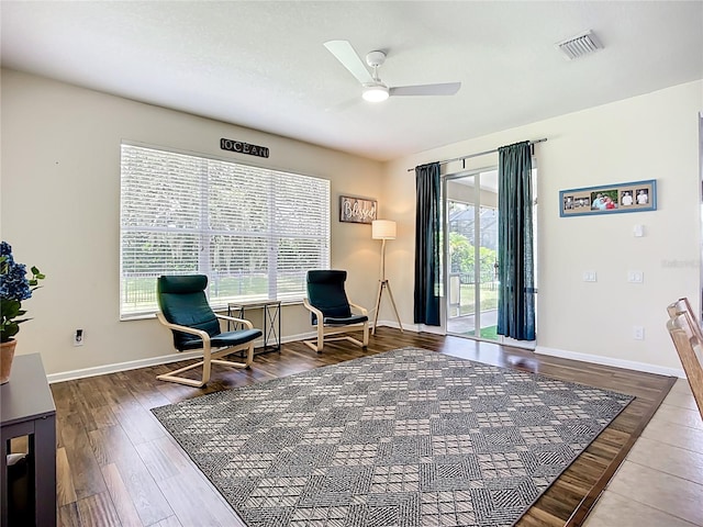 5830 100th Ave E, Parrish, FL 34219 - living area with ceiling fan and wood finished floors